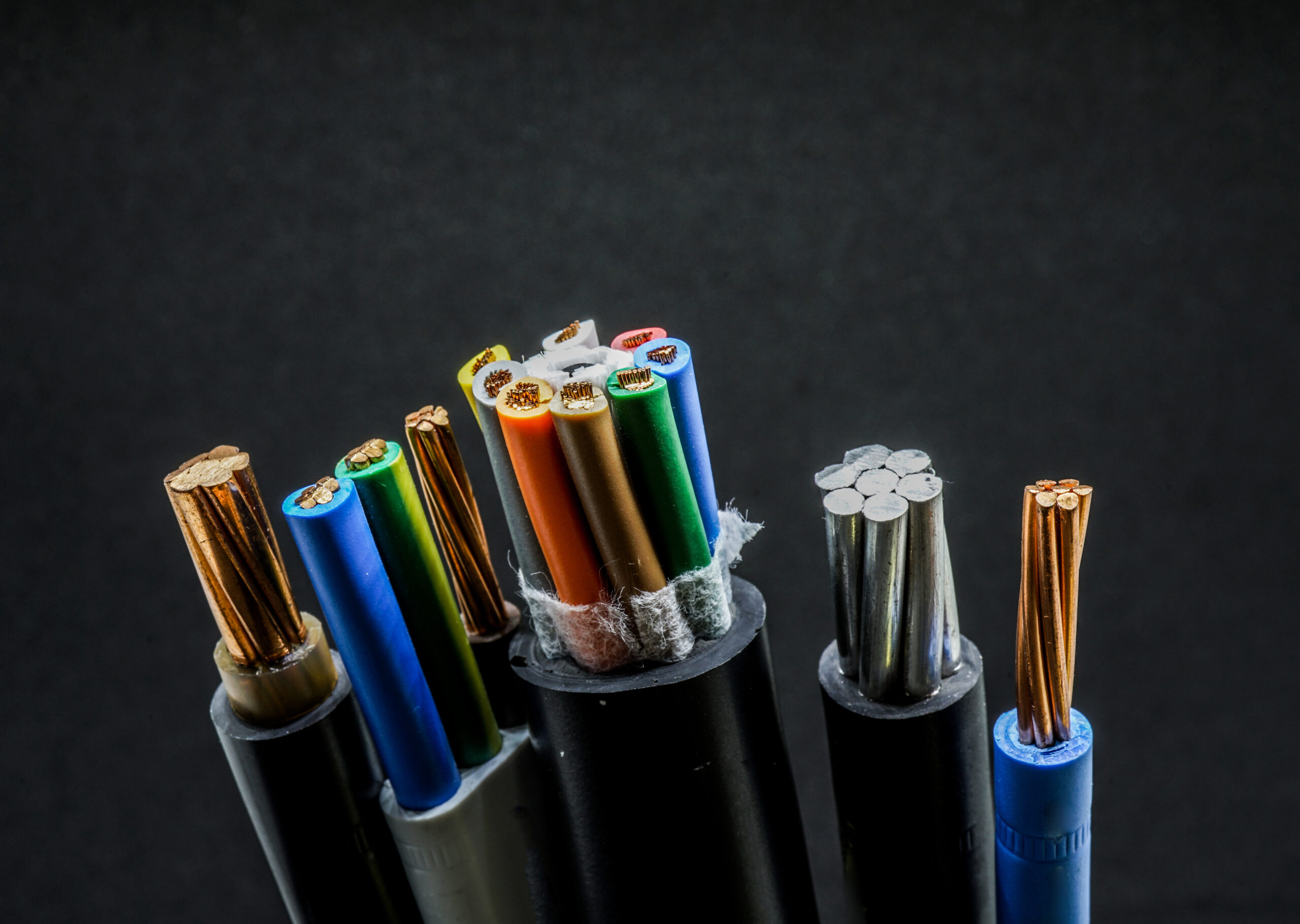 Wires and copper with black background in the studio.